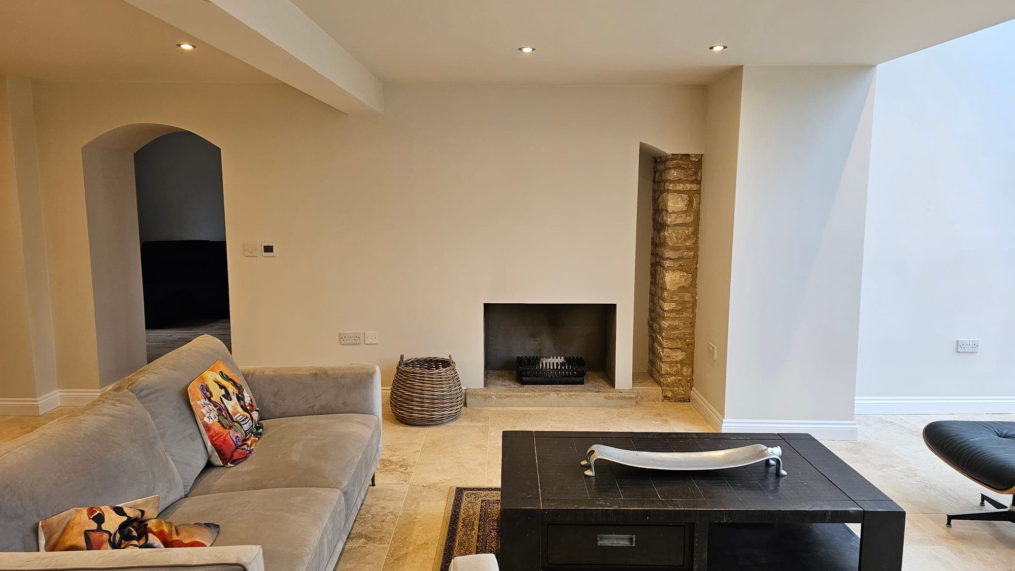 Sitting room with the fireplace and stone reveal