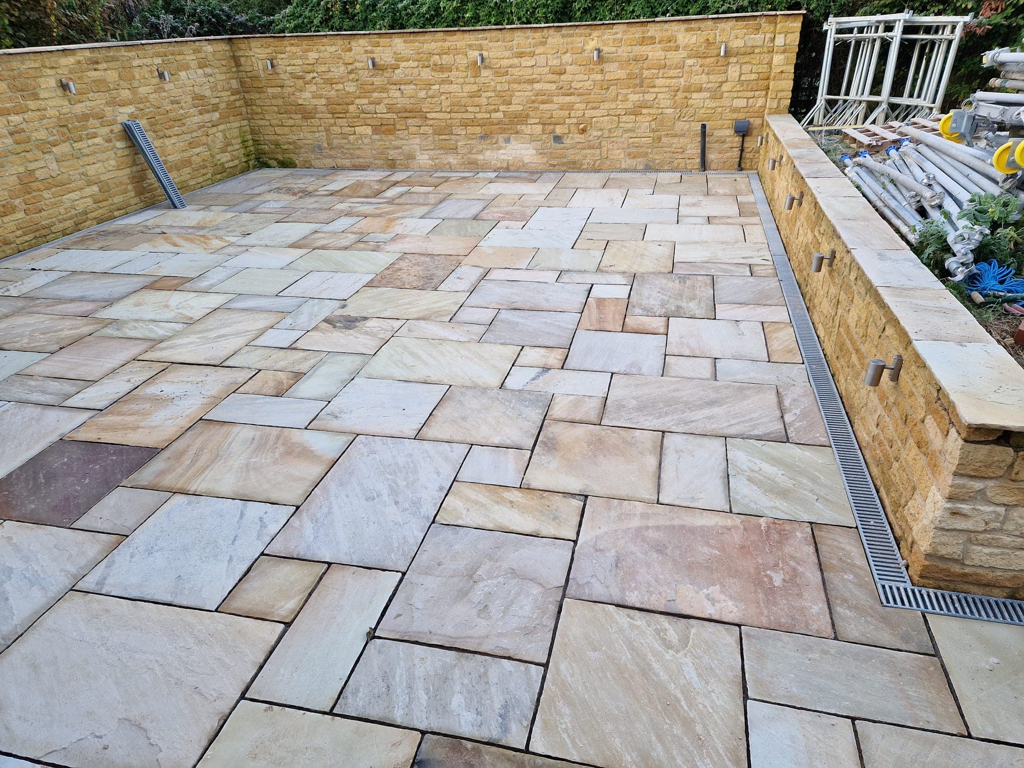 The finished terrace, drainage channel and retaining wall