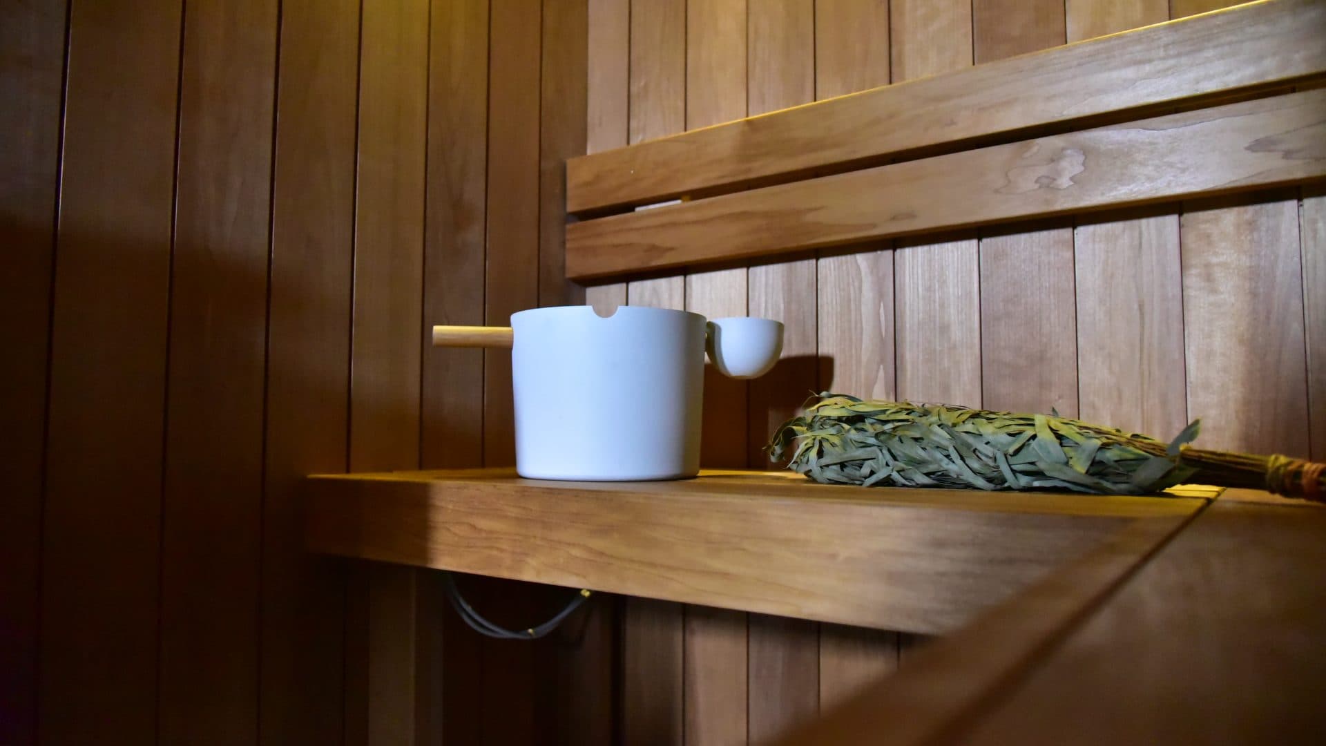 Bucket, ladle and whisk on the bench